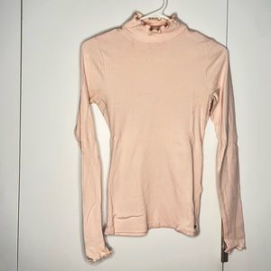 Pink turtleneck ruffle